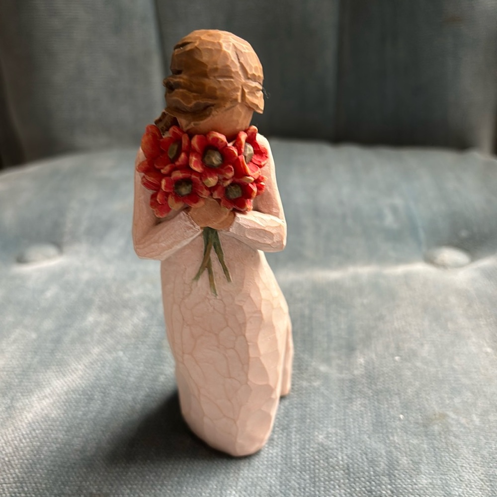 Willow tree surrounded by love figurine